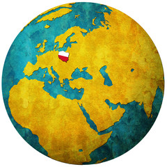 poland flag on globe map