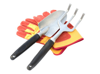Gloves and  tool on a white