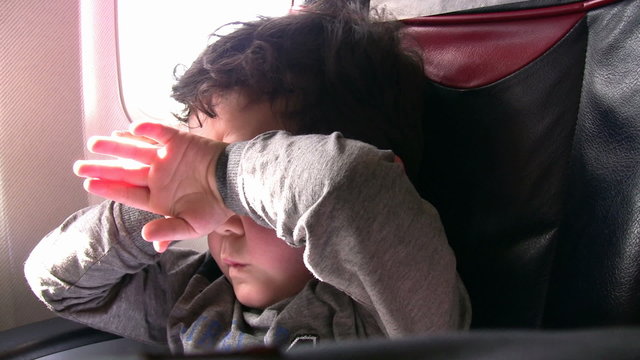 Long Travel and sleeply little boy