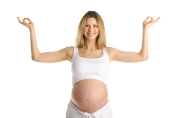 Pregnant woman practicing yoga