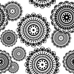 seamless pattern of round black and white ornaments