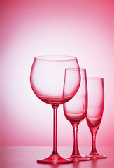 Wine glasses against gradient background