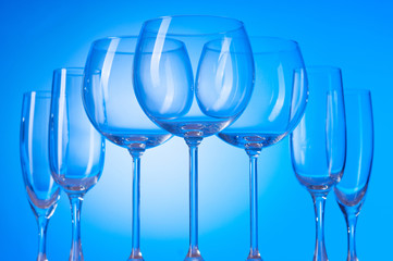 Wine glasses against gradient background
