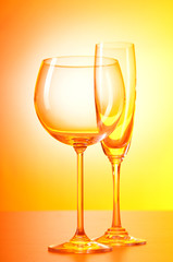 Wine glasses against gradient background