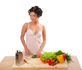 Housewife with vegetables .