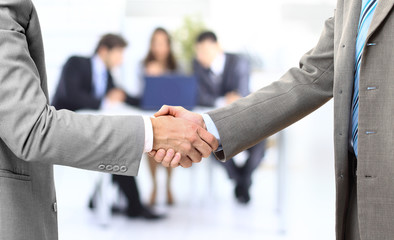handshake isolated on business background
