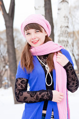 woman is in winter in a park