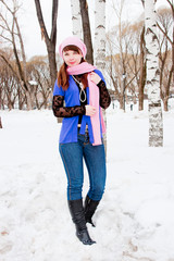 woman is in winter in a park