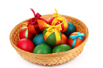 Easter eggs in backet isolated on white