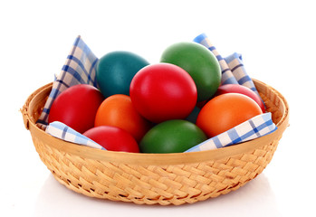 Easter eggs in backet isolated on white