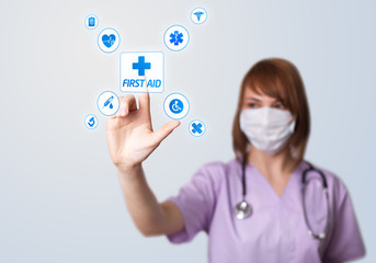 Woman doctor pressing digital button