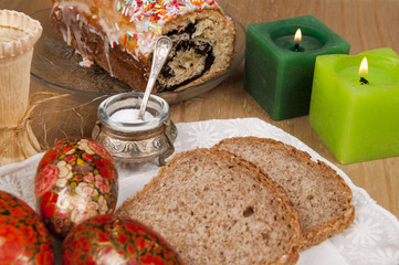 poppy-seed cake with easter egg and candles