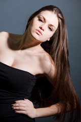 Naklejka premium Beautiful lady with long brown hair