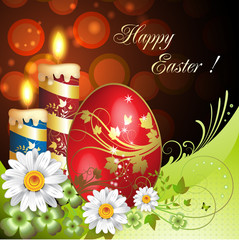 Easter card with flowers, candles and decorated egg