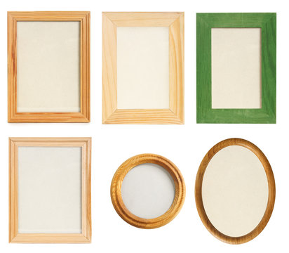 many different wooden photo frames isolated
