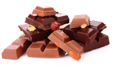 Many chocolate   pieces on white background