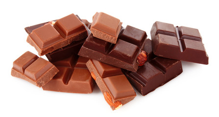 Many chocolate   pieces on white background