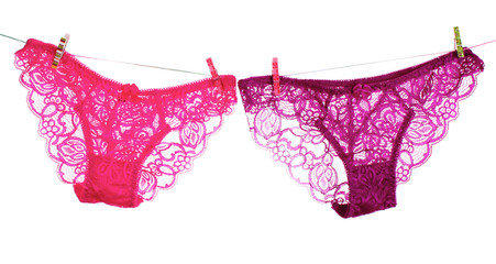 Woman's panties  hanging on white background