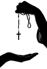 hand give rosary