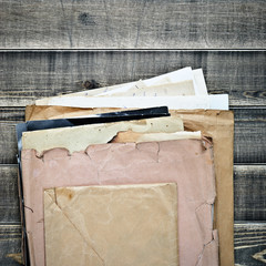 old papers on a wooden table. Closeup