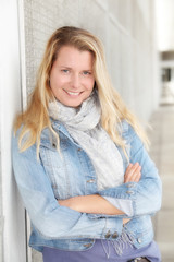 Fototapeta premium Portrait of beautiful modern woman in town