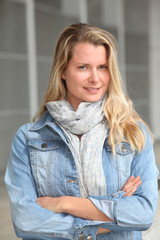 Portrait of beautiful modern woman in town