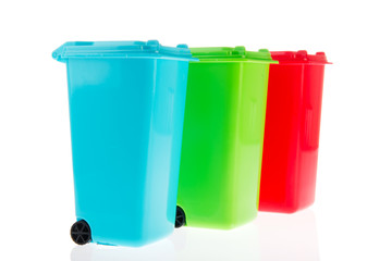 Three plastic roll containers