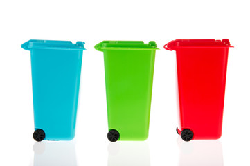 Three plastic roll containers
