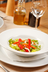 Vegetable salad with calamari