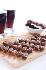 Grilled chicken hearts on skewers