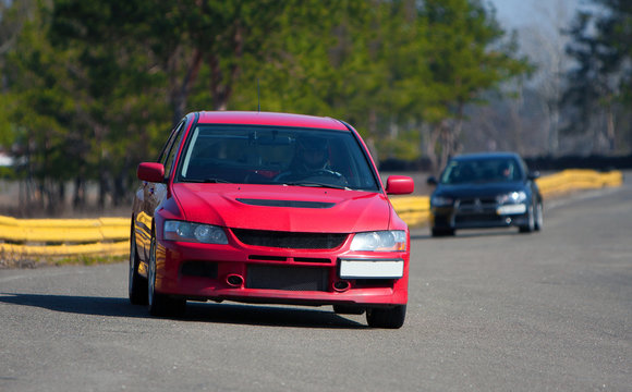 Fototapeta Red car on track