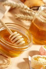 Honey with wood stick