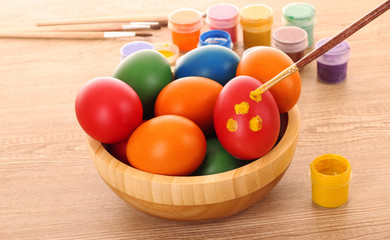 Fototapeta na wymiar easter eggs, color paint and brush