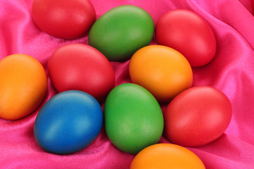 Colorful Easter Eggs on Textile background