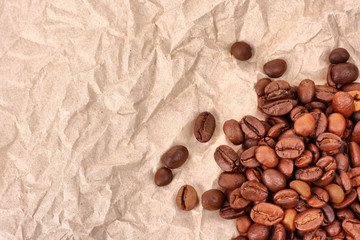 Brown crumpled paper and coffee beans