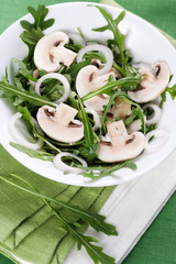 Salad with rucola and mushrooms