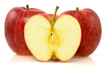 red apples with reflection on white background