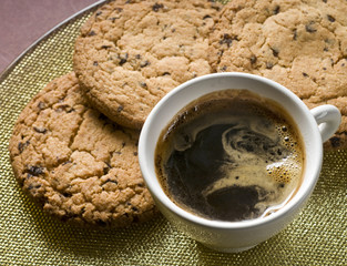 Coffee cup and chocolate cookies