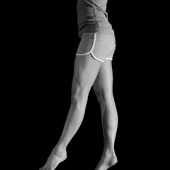 female gymnast on balance beam