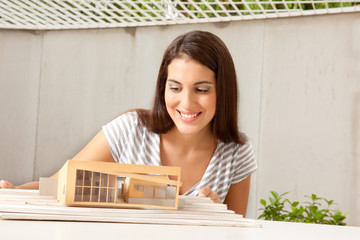 Architect with Model House