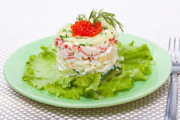 Salad of vegetables with red caviar