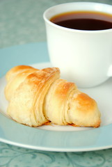 Croissant and a cup of tea