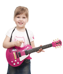 Little girl playing toy pink electric guitar
