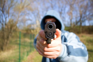 robber with a gun