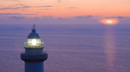 Fototapeta na wymiar Sunset at the Lighthouse Igueldo, Cantabrian Sea