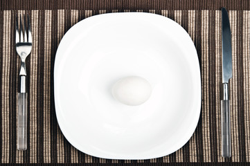 Egg on food plate