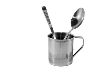 Traveller's cap with two spoons inside.