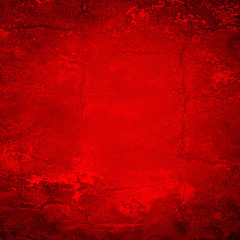 rote Wand mit Rissen