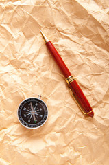 Vintage compass on the paper in adventure concept