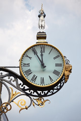 Fototapeta na wymiar Ancient street clocks